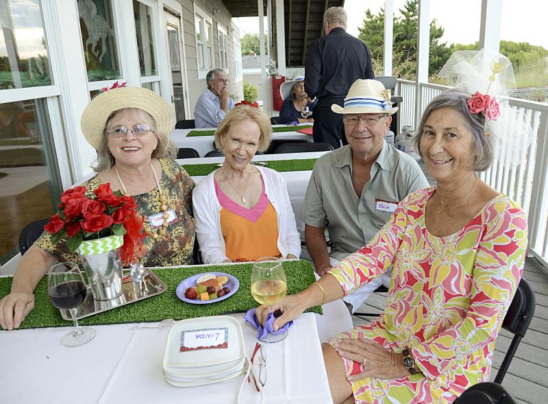 Donna Nacchia, Artisans Bank sponsor; Lina and Skip Dunbar and Helen Schneck enjoy the weather on the deck.